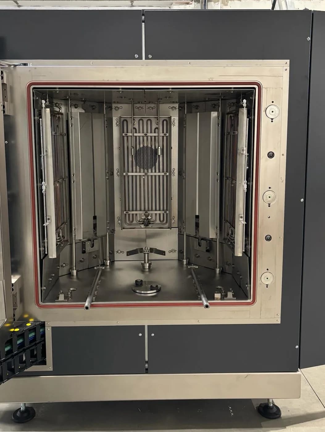 Front view of an Asgard Thor coating chamber with heating elements