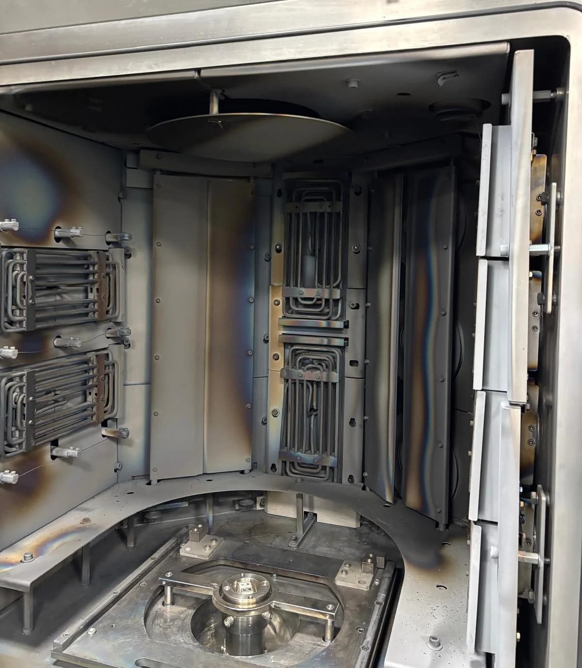 Inside an Apex N600 coating chamber with heating and turntable